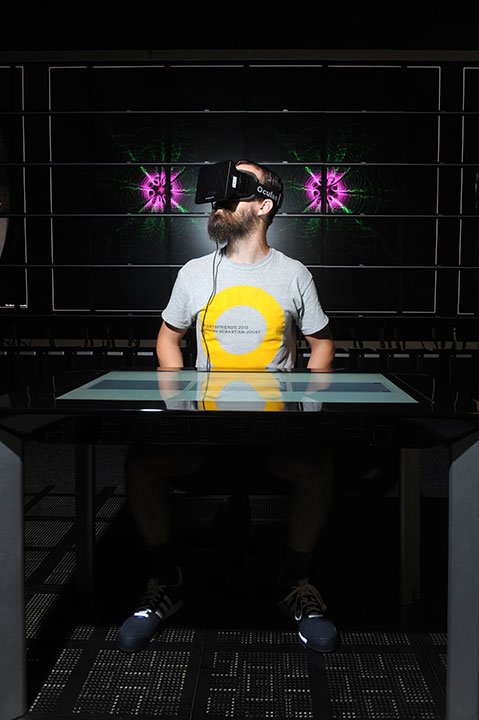 Oculus Rift wearer at the University of Texas at Austin Visualization Laboratory 