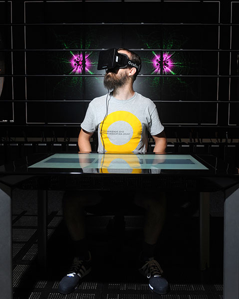 Oculus Rift wearer at the University of Texas at Austin Visualization Laboratory 