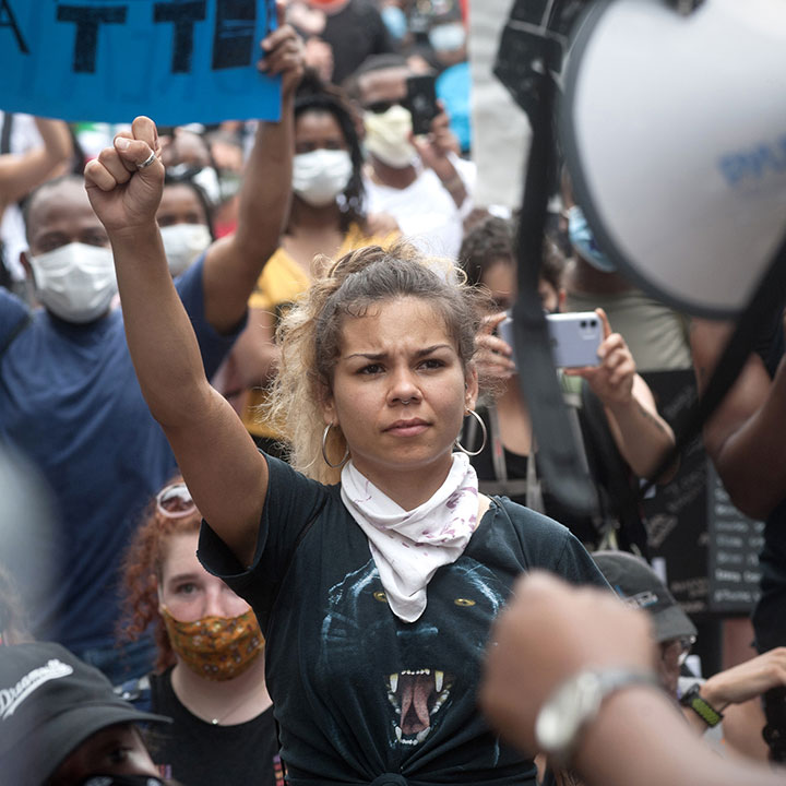 A protester raises a fist during a rally outside the State Capitol in Austin, Texas, May 31, 2020