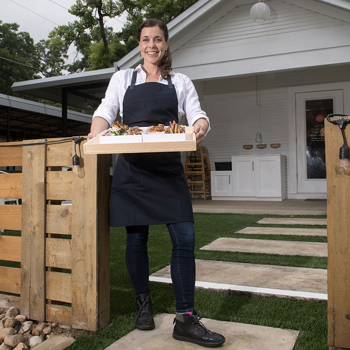Bento Picnic owner Leanne Valenti holds a bento box