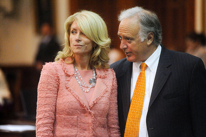 Texas State Senators Wendy Davis and Kirk Watson confer during debate on House Bill 2, an abortion restriction measure
