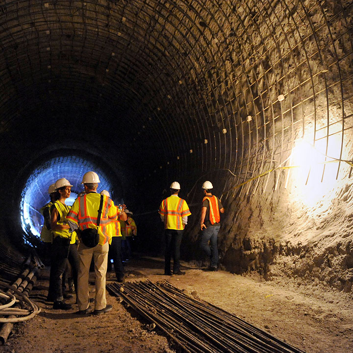 Media representatives tour the Waller Creek tunnel construction site